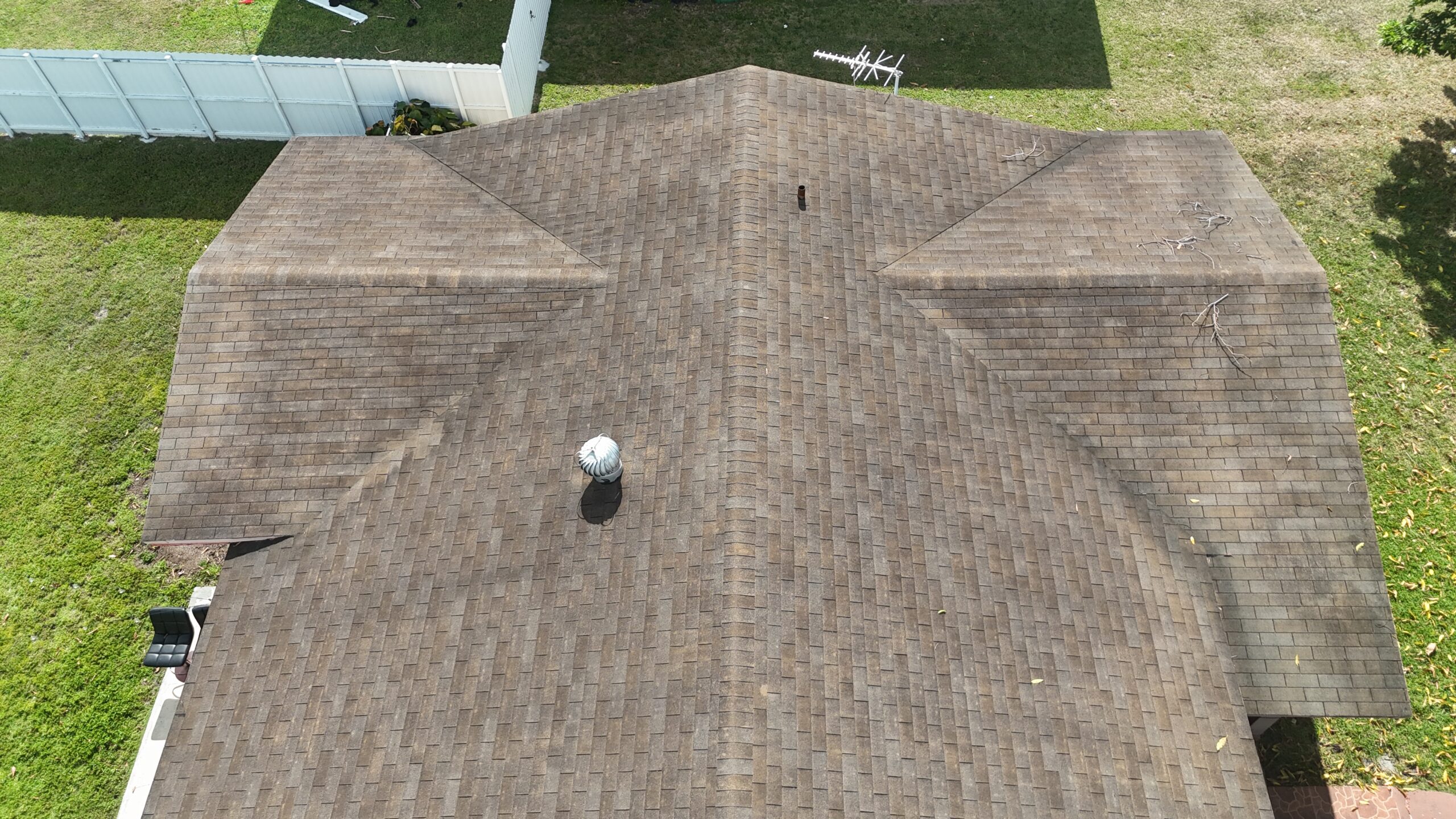 Before aerial view 4 of the shingle roofing project in Cutler Bay, Florida