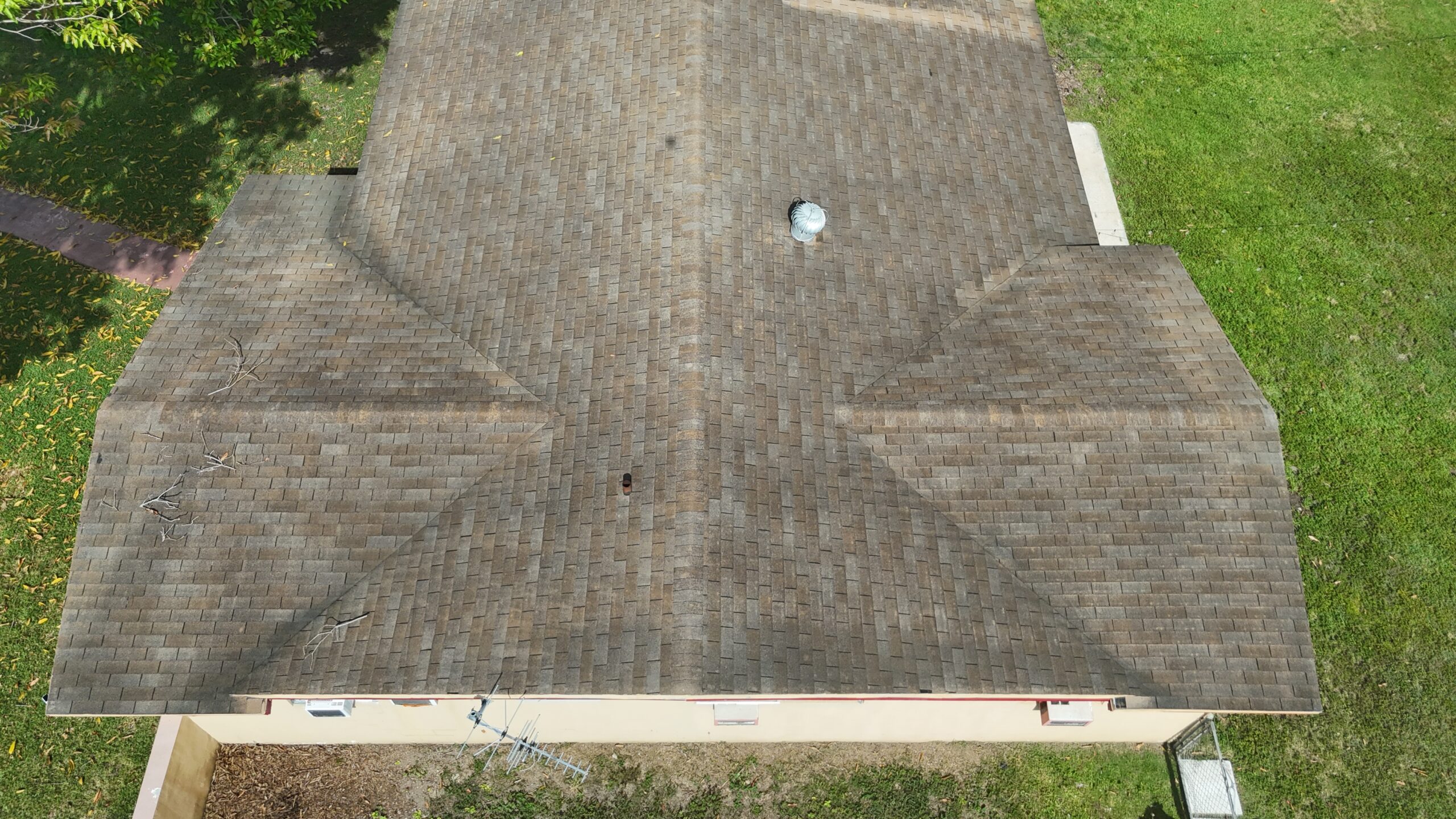 Existing shingle roof in Cutler Bay before replacement